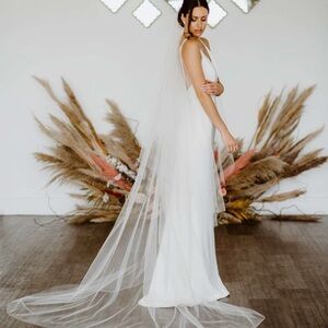 Elegant White Bridal Gown with Veil